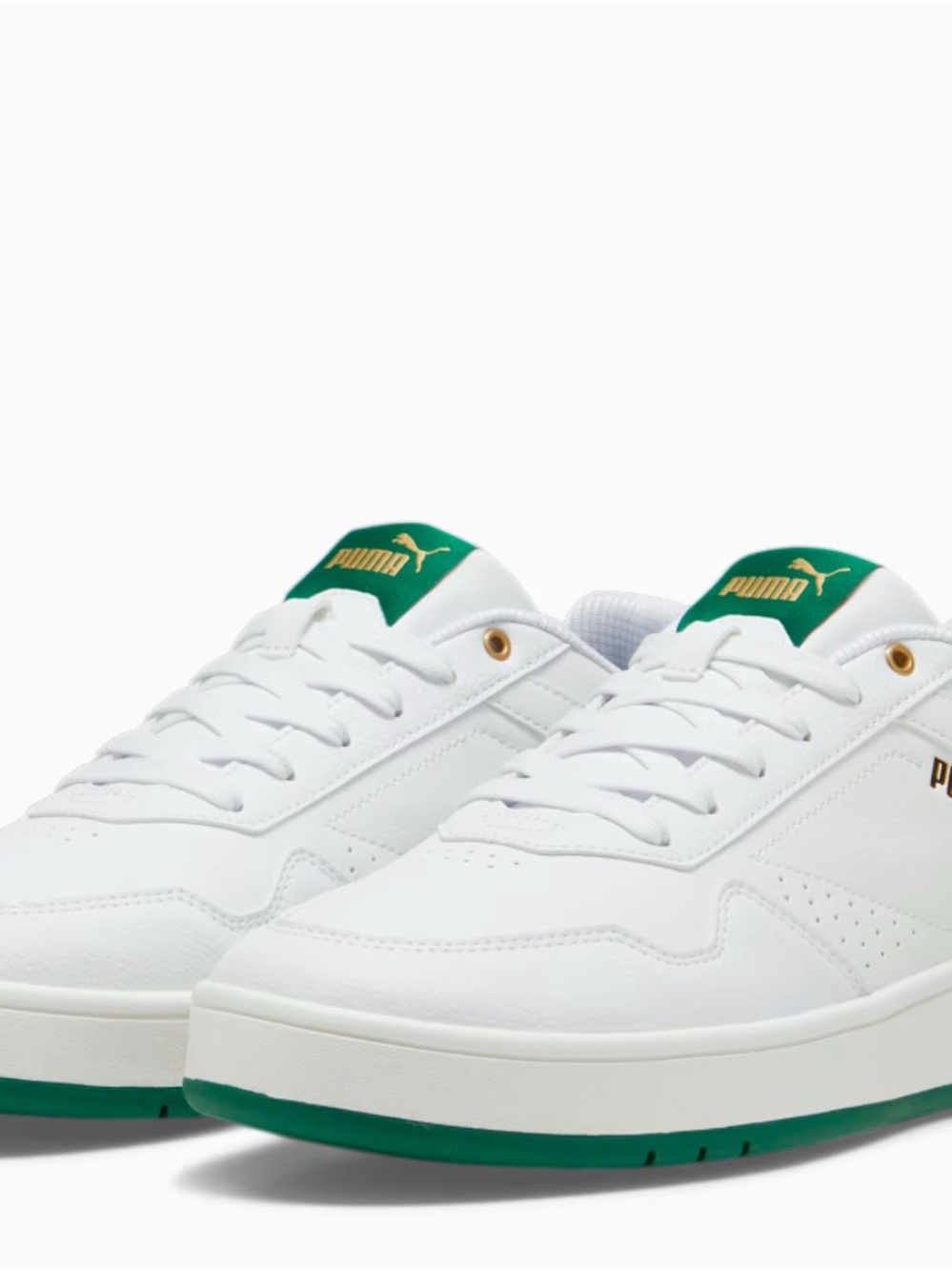 Puma White Sneakers with Green Trim and Gold Logo
